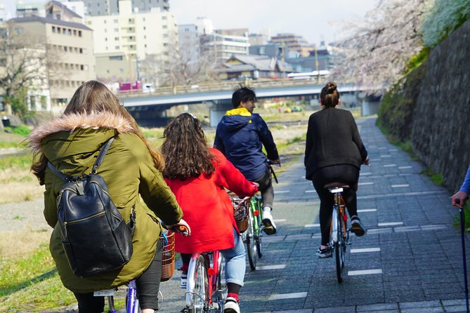 4.5-Hour Kyoto Bike Tour with Lunch and UNESCO Zen Temples - Riverside cycling beside the Kamogawa