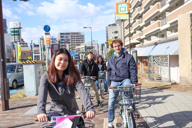 5-Hour Osaka Bike Tour to the Neighborhood of Osaka Castle - Lunch, okonomiyaki, mochi, and green tea