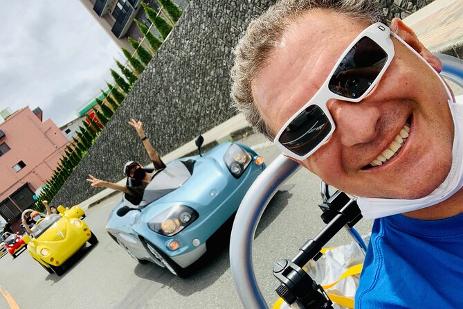 Cute & Fun E-Car tour following guide around Lake Kawaguchiko - Photos, local stories, and the guide’s role