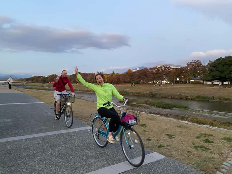 Cycle Kyoto's Hidden Gems & Gion Stroll - Riding beside the river