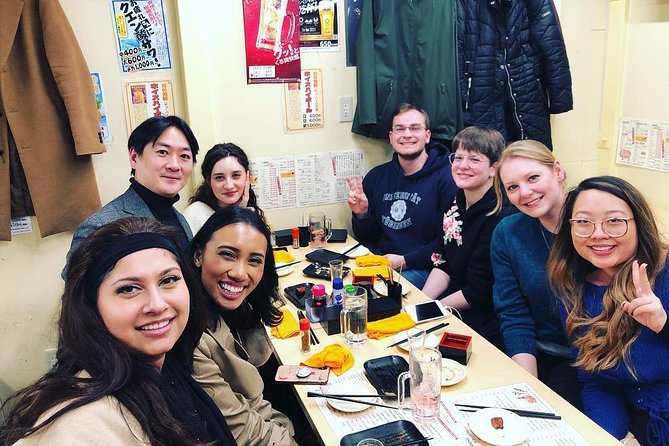 Eat and Drink Like a Local: Tokyo Ueno Food Tour-Taverns&Ramen - Walking through Ameya Yokocho