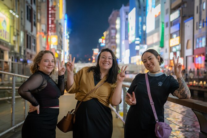 Guided Photography Tour in Osaka: Capturing Memories - Walking beside the Dotonbori river
