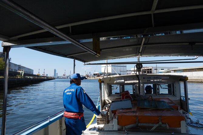Half day Osaka Bay Area Cycling with E-Assist Bicycle Tour - Factory roads and the Funamachi ferry reveal working Osaka