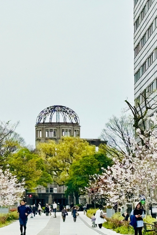 Hiroshima: History of Hiroshima Group Walking Tour - Mother and Baby in the Storm