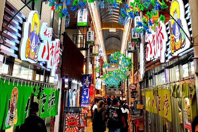 Hungry Osaka Street Food Tour:15 Tastings & 3 Drinks with a Local - Five eateries, five different moods