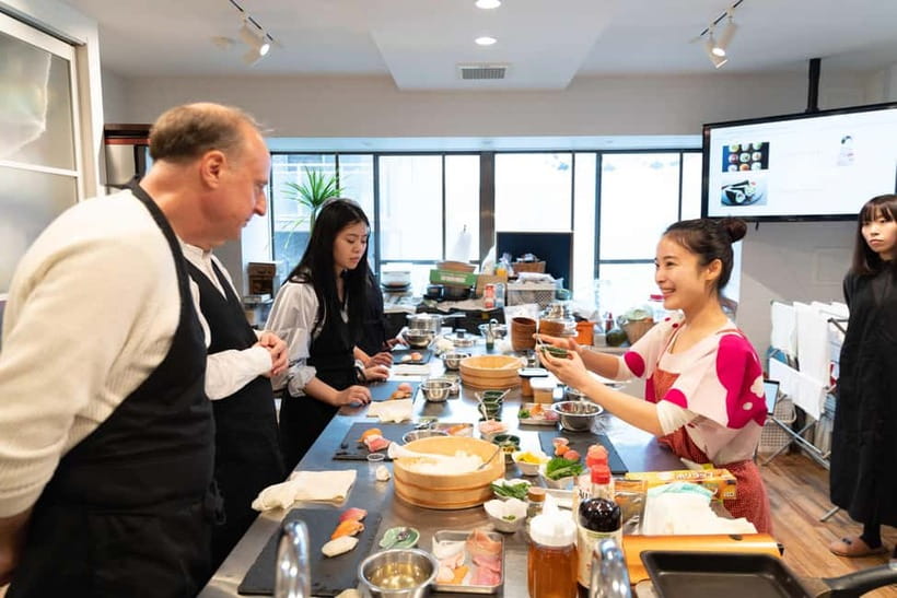 Kyoto: Enjoy Sushi & Market Tour! Best for Family & Couple! - Sitting Down to Eat What You Made