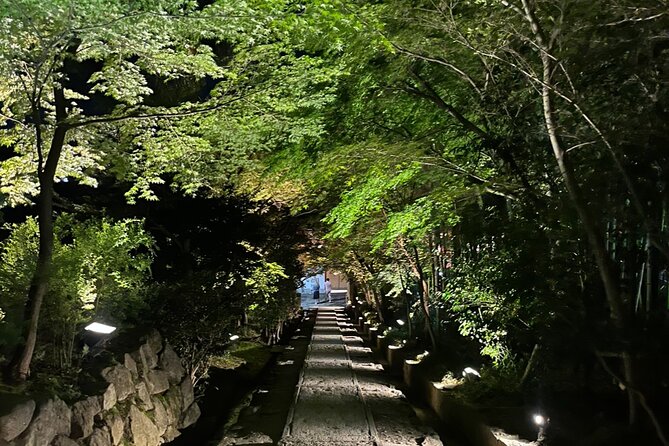 Kyoto: Gion Magical Night Walking Tour - The memorial with the large Kannon statue