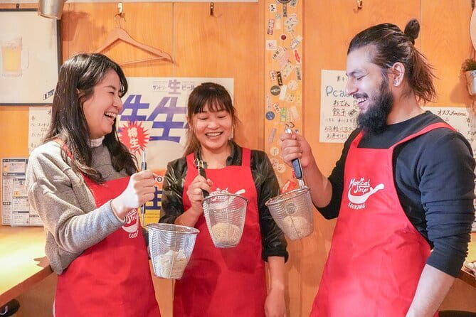 Kyoto Ramen and Gyoza Cooking Class with Professional Chefs - Folding gyoza and pairing them with drinks