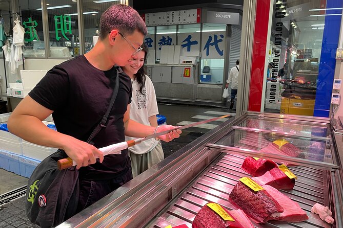 Master the art of Sushi : Toyosu Market Tour & Tuna Cutting - The tuna-cutting session in Azabujuban