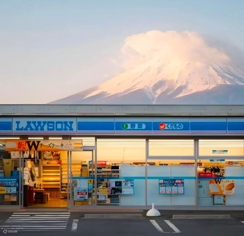 Mount Fuji Day Trip: Includes Kawaguchiko Tenjozan Park Ropeway Ticket & Arakurayama Sengen Park & Nichikawa Clock Shop & Lawson Convenience Store & Oishi Park (Departing from Tokyo) - Taking a short walk through Fujiyoshida