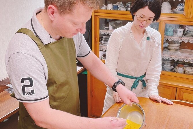 Near Fushimiinari: Kyoto Home Cooking Class & Supermarket tour - Learning dashi before the cooking begins
