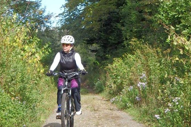 Nopporo Forest Mountain Bike Tour from Sapporo, presenting a retro Cycle cap - Why the small group makes a difference
