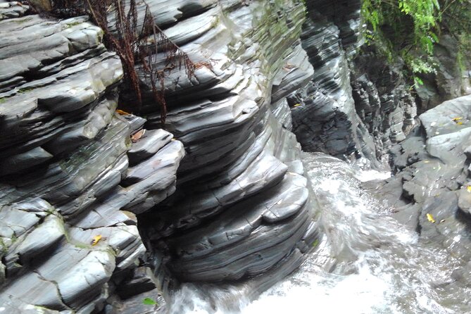 Okinawa Jungle Trails & Waterfalls – Private Yanbaru Tour - Following the river over rocks and mini waterfalls