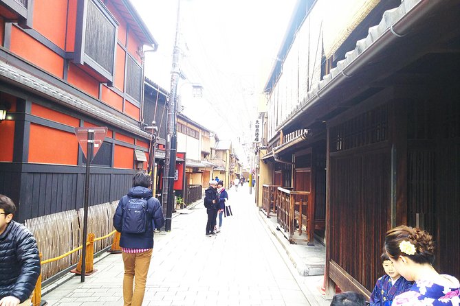 One-Day Walking Tour : Enjoy Kyoto to the fullest! - Walking beneath the torii at Fushimi Inari