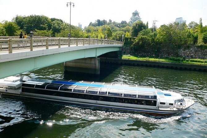 Osaka Afternoon Walking Tour with Osaka River Cruise - Walking Through Osaka Castle Park