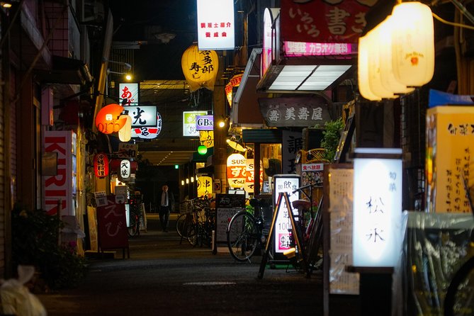 Osaka Bar Hopping Night Walking Tour in Namba (3 bars, 6 tastes) - Hozenji Temple: a quiet pause in the middle of the night
