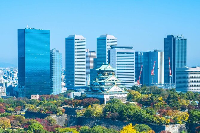 Osaka Castle Admission Ticket - Approaching the castle through moats and stone walls