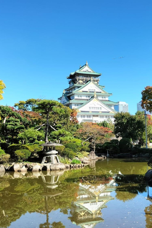 Osaka Castle Guided Tour - Walking the castle grounds and stone walls