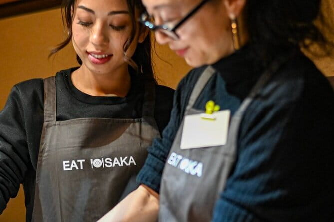 Osaka Cooking Class and Sake Tasting with Local Supermarket Visit - Folding gyoza without kitchen panic