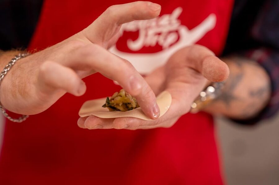 Osaka: Cooking Class & Sake Tasting with Local Market Visit - Flipping Osaka-style okonomiyaki