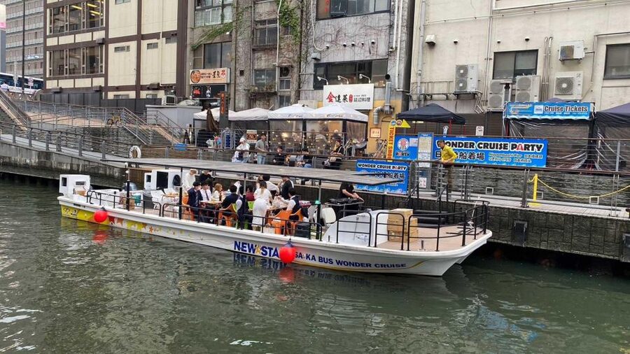 Osaka: Dotonbori District River Cruise with Drink Discount - Guides, music, and the mood on board