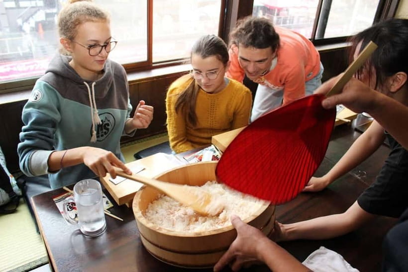 Osaka Dotonbori: Hand Roll Sushi Experience - Making sushi beside the Dotonbori River