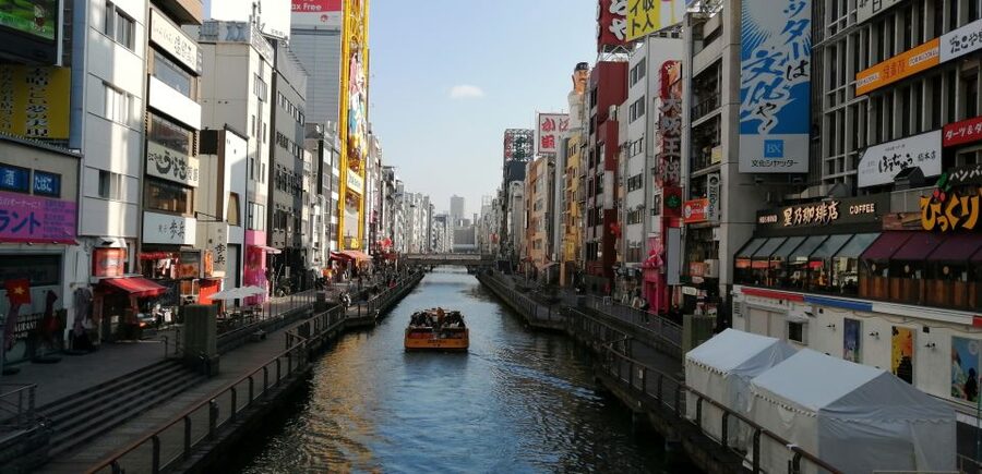 Osaka: Five Must-See Highlights Walking Tour & Ramen Lunch - Dotonbori and the Famous Running Man