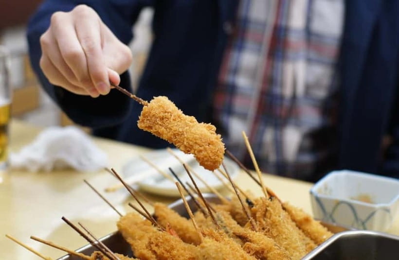 Osaka: Food Tour Kuromon Market & Dotonbori with Guide - Hozenji’s old lanes and Osaka comfort food