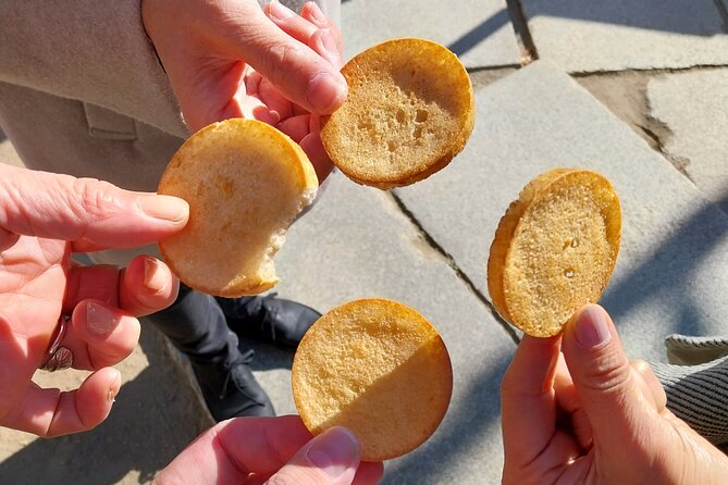 Osaka Food Tour with 10 Classic Japanese Tastings & Drinks - Taiyaki, dango, and a sweet finish