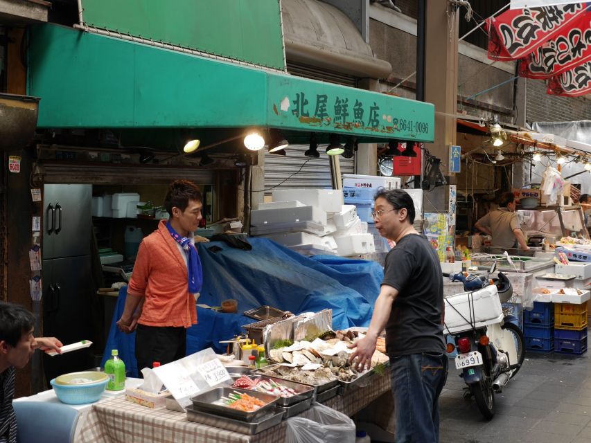 Osaka: Full-Day Sightseeing Tour by Private Vehicle - Kuromon Ichiba is a market for looking and tasting