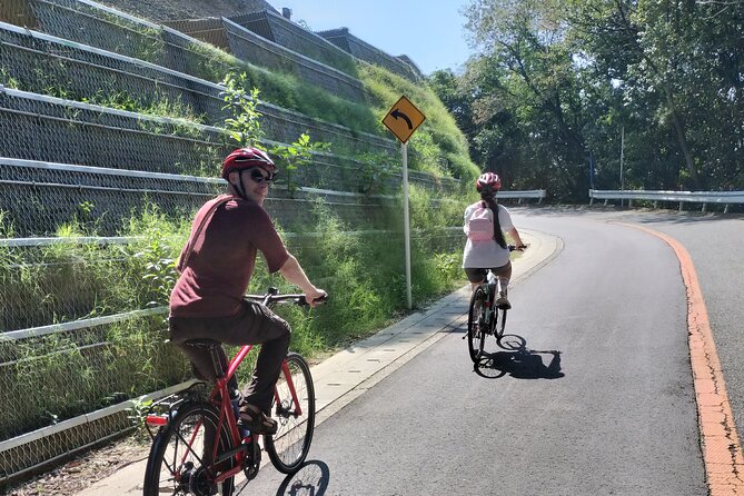 Osaka Half-day E-bike Adventure: Minoh Falls & Katsuoji Temple - Riding beside the railway and into the hills