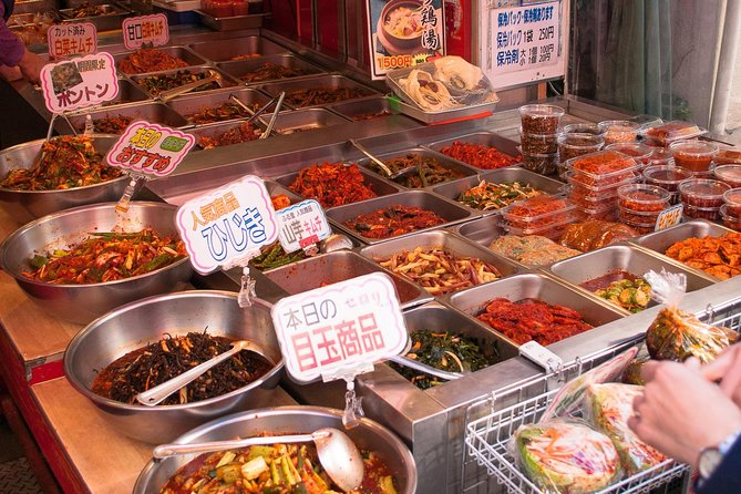 Osaka Highlights: 4-Hour Walking Tour with Castle - Dotonbori: famous signs, small backstreets