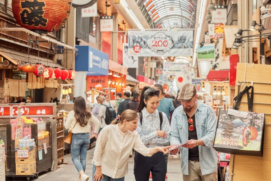 Osaka: Highlights & Hidden Gems Private Walking Tour - Dotonbori’s giant signs and the Glico Running Man
