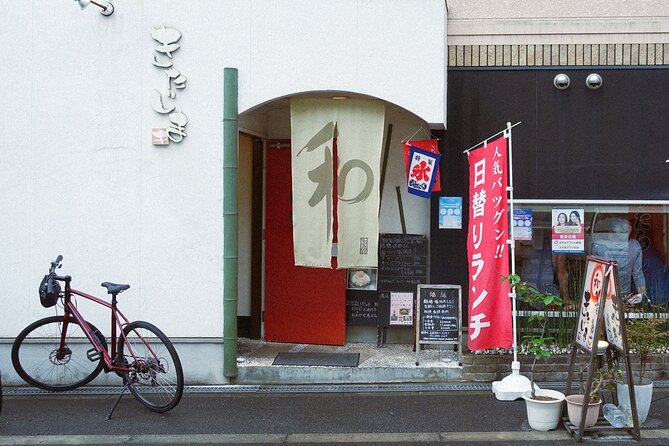 Osaka Japanese Cooking And Matcha Class near Osaka Castle - Adding sake to the meal