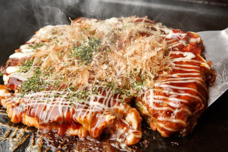 Osaka: Local Foodie Tour in Dotonbori and Shinsekai - Starting beneath Tsutenkaku in Shinsekai