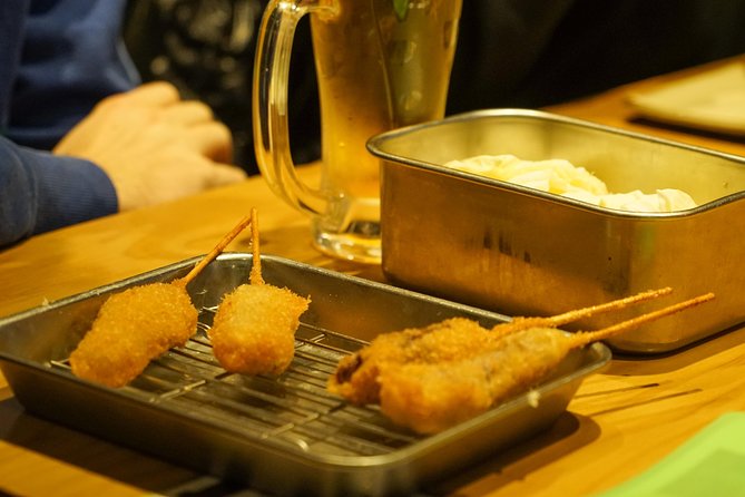 Osaka Local Foodie Walking Tour in Dotonbori and Shinsekai - Six kushikatsu skewers in Jan-Jan Yokocho