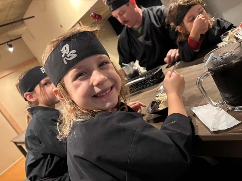 Osaka: Ninja Experience Cafe in Dotonbori - Changing into a ninja costume