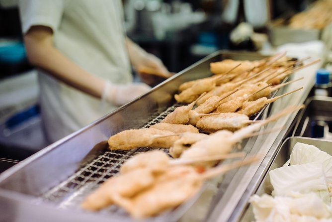 Osaka Private Food Tours by Local Foodies: 100% Personalized - Shinsekai and Tsutenkaku after dark