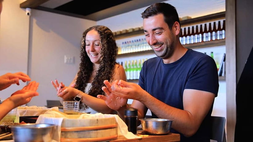 Osaka: Roll and Authentic Sushi Making Class in Dotonbori - Making maki rolls with prepared ingredients