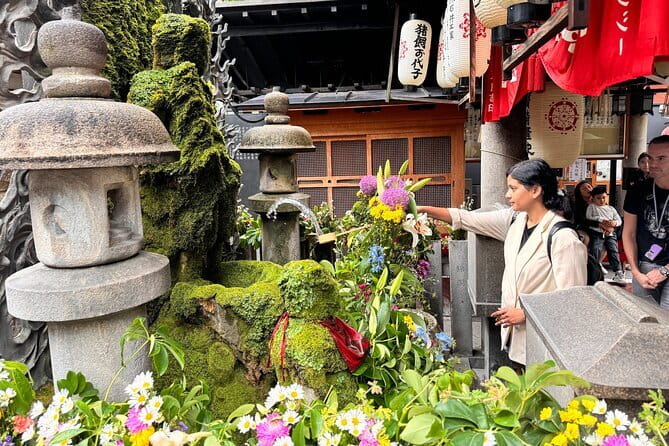 Osaka's Secret Adventures: Daruma Magic and Minoh Falls - What the $149.58 price covers