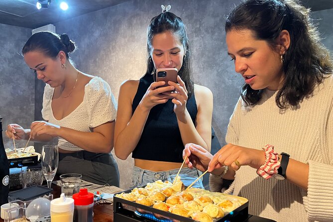 Osaka Sake Tasting & Takoyaki Cooking Experience - Choosing your favorite from the seasonal menu