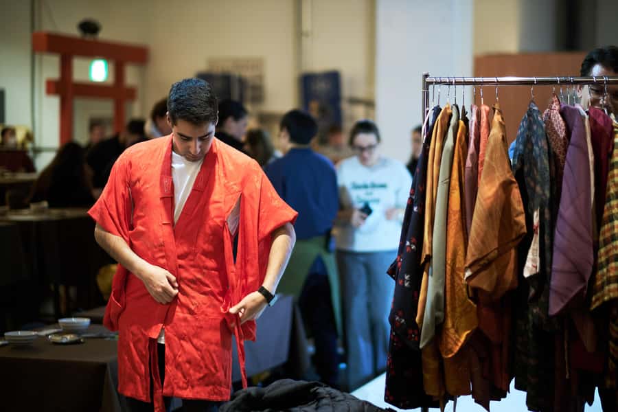 Osaka: Sumo Show & Experience w/ Optional Kimono & Hot Pot - Taking on a sumo wrestler yourself