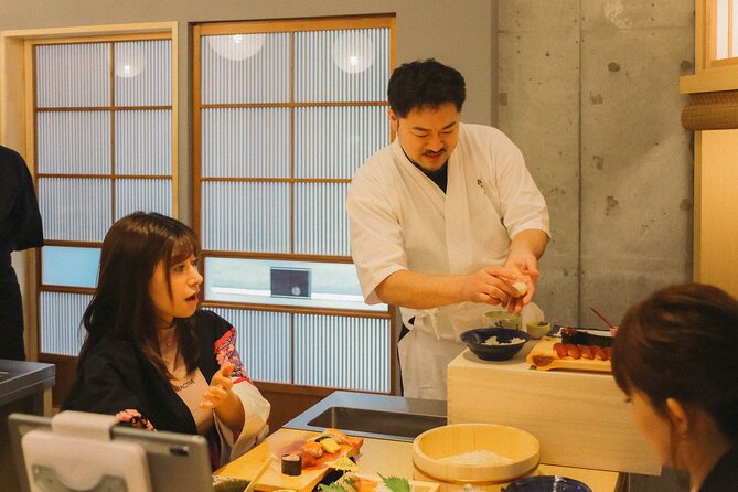 Popular Sushi Making Class near Tokyo Tower - Making sushi with salmon, tuna, and prepared rice