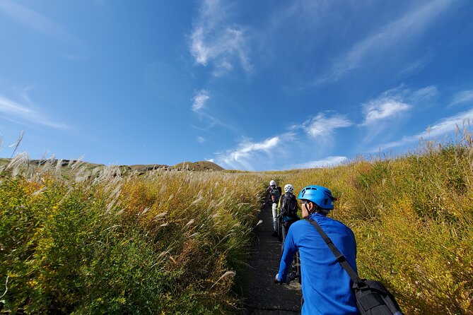 Private E-MTB guided cycling around Mt. Aso volcano & grasslands - Who Will Enjoy This Most