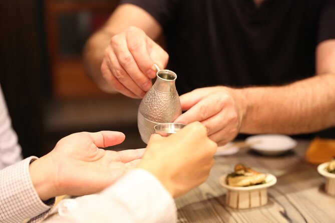 Private Food & Sake Tour in Central Kyoto with Sake Sommelier - Stop one: a machiya izakaya in a traditional townhouse
