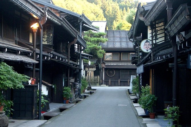 Takayama Half-Day Private Tour with Government Licensed Guide - Hida Folk Village adds mountain scenery and traditional homes