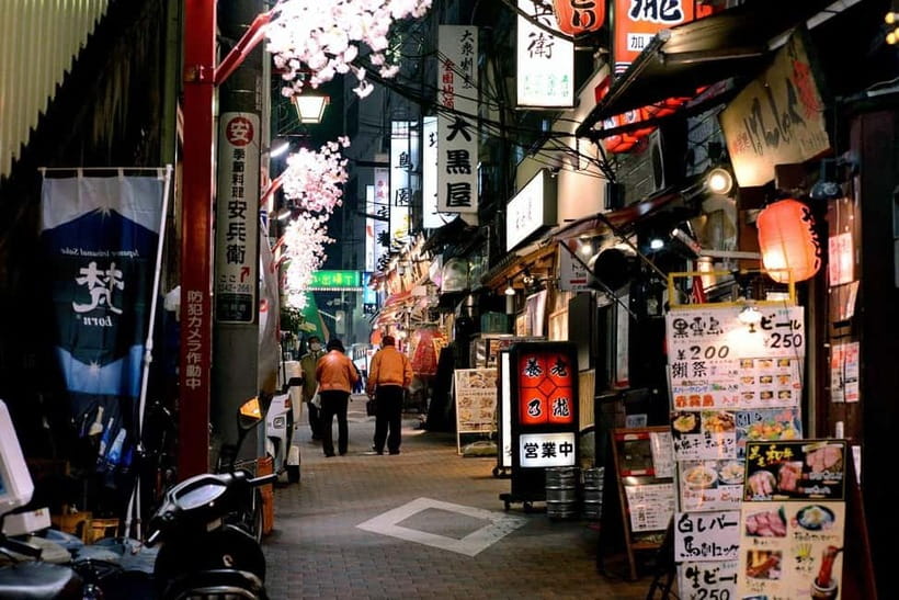 Tokyo: Akihabara, Shibuya, Karaoke & City Lights Night Tour - Walking through Kabukichō in Shinjuku