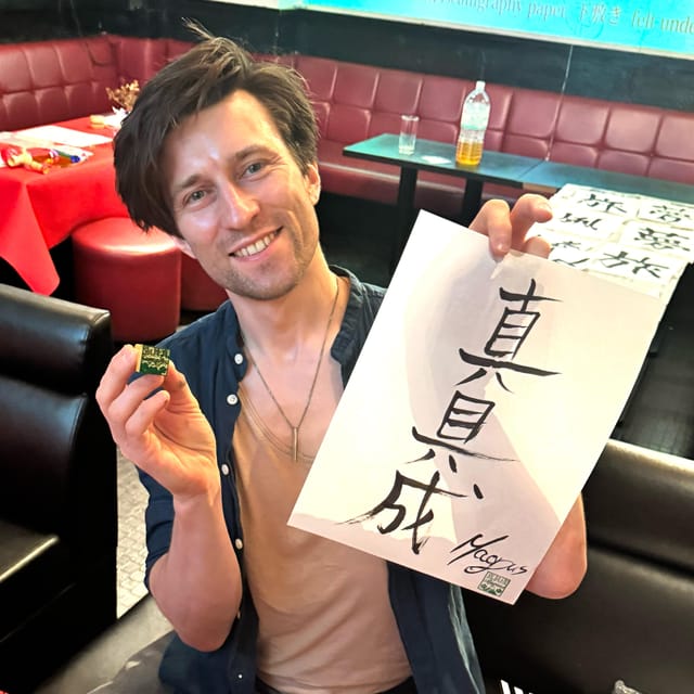 Tokyo: Calligraphy on Kanji Fan & Scroll with Drink - Making Your Hanko Stamp and Sorting the Souvenirs