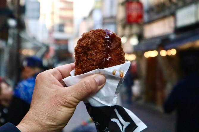 Tokyo: Food Tour in Ueno with 10+ Tastings of Japanese Classics - Food beneath the train tracks