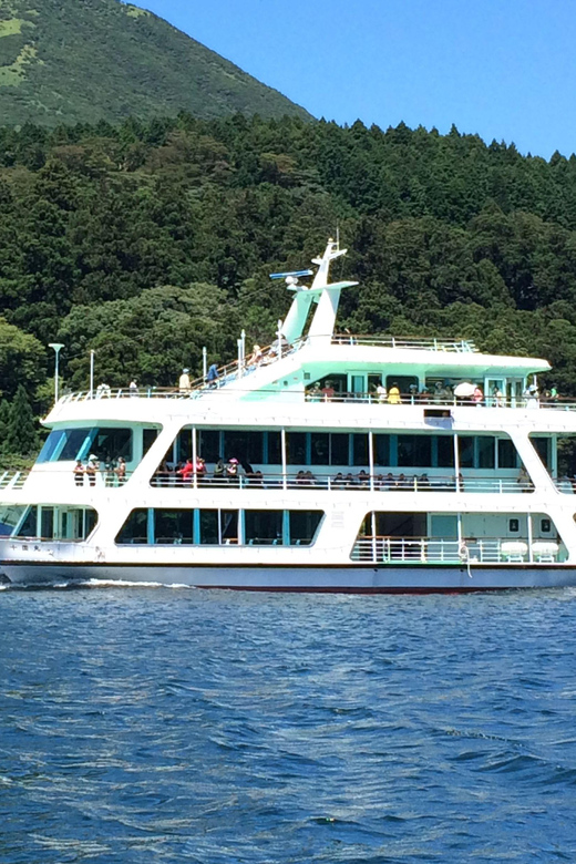 Tokyo Mt Fuji 5th St & Hakone Cruise Bus Tour w/Bullet Train - Cruising Lake Ashi beneath Hakone’s peaks